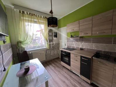 Komlón a Szilvási dombtetőn, azonnal költözhető zöldövezeti napfényes lakás eladó (109459-thumb)